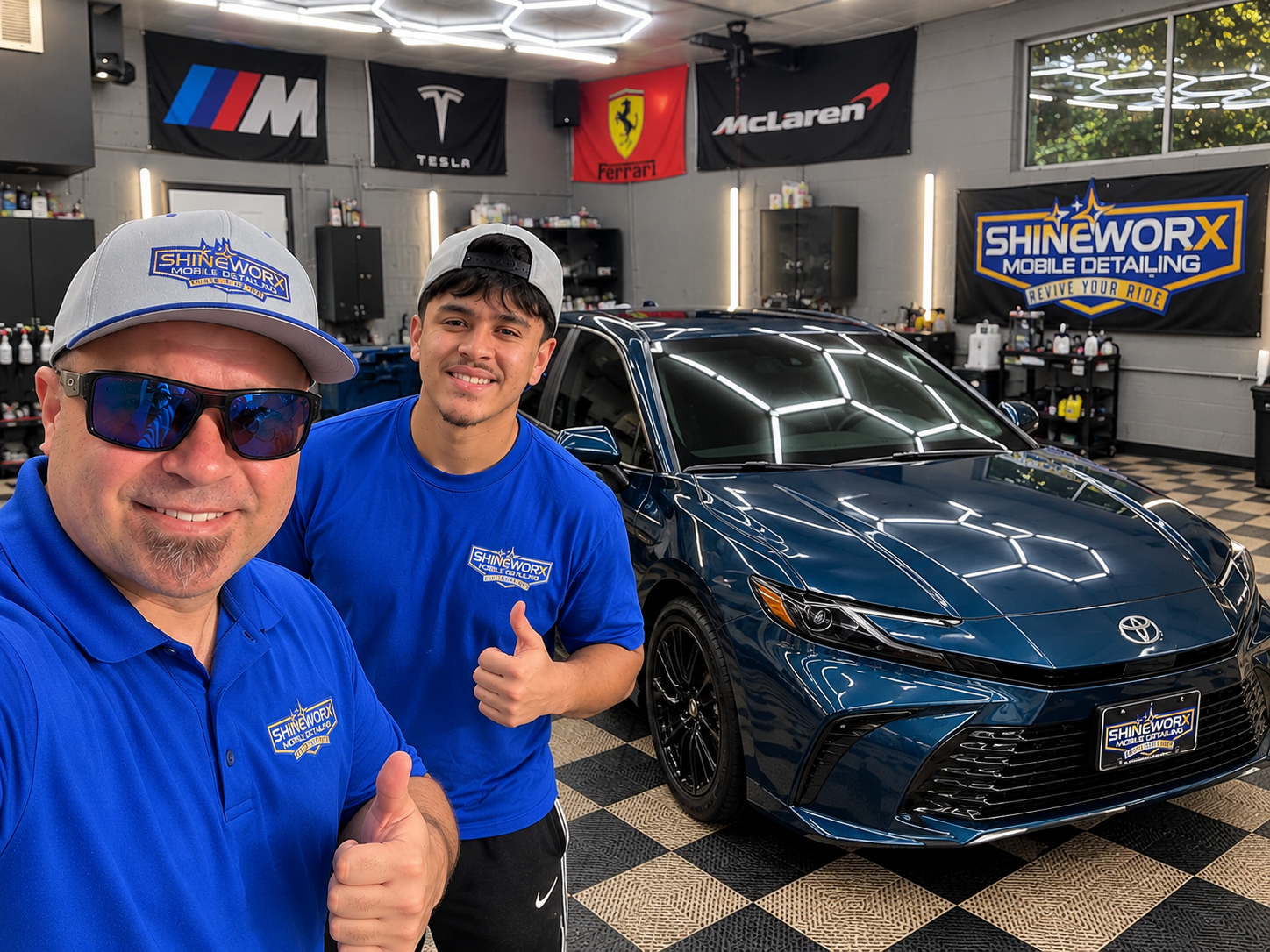 Shineworx team with a freshly tinted Toyota Camry at the Beaverton shop