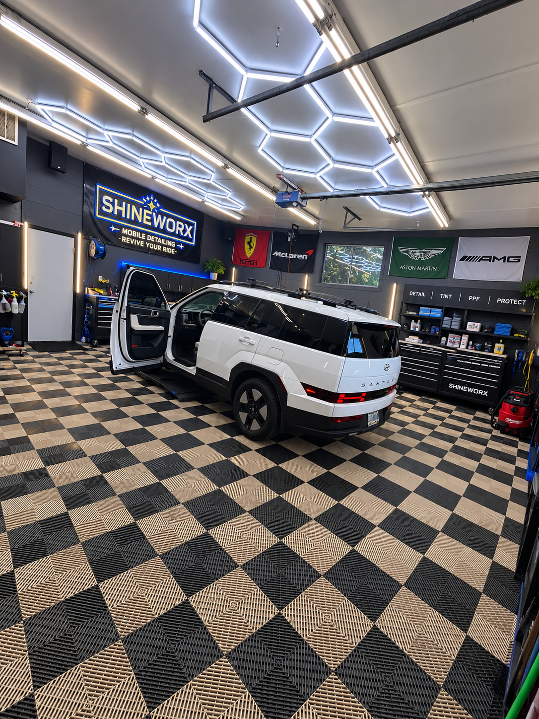 Vehicle inside the Shineworx Beaverton detailing, tint and protection studio