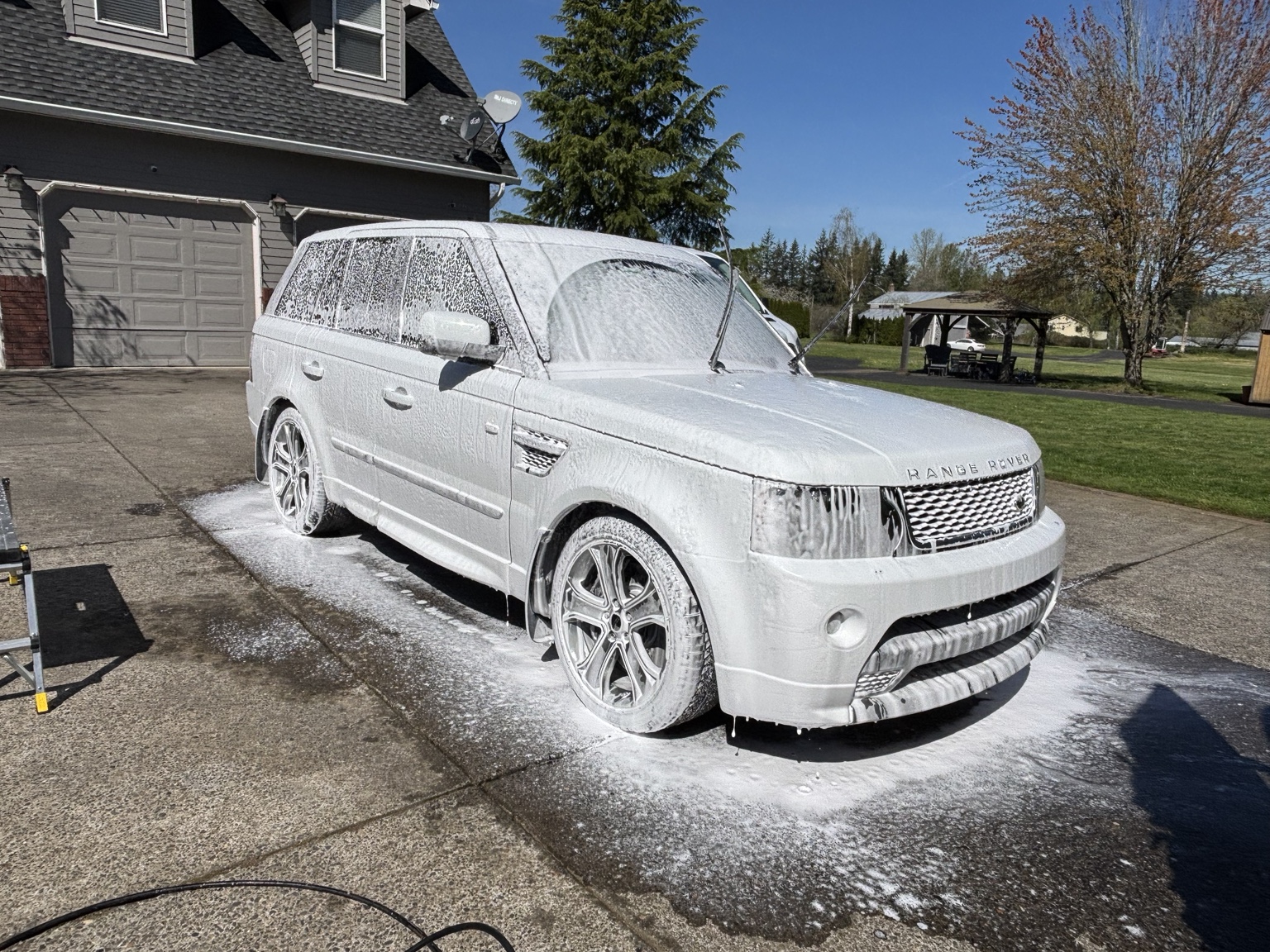 Foam wash being performed on a Range Rover